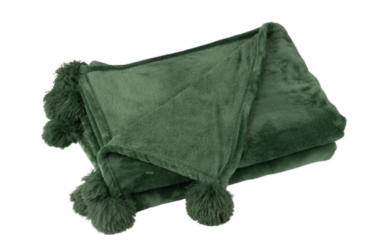 Van Bank tot Bed: Waarom Plaids en Dekens Onmisbaar Zijn.