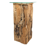 Bewonder de exclusieve Pilaar Root, vervaardigd uit uniek teakwortelhout en afgewerkt met een transparant glazen tafelblad voor een moderne touch.