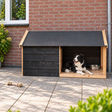 Bordercollie ontspannen in douglas houten hondenhok