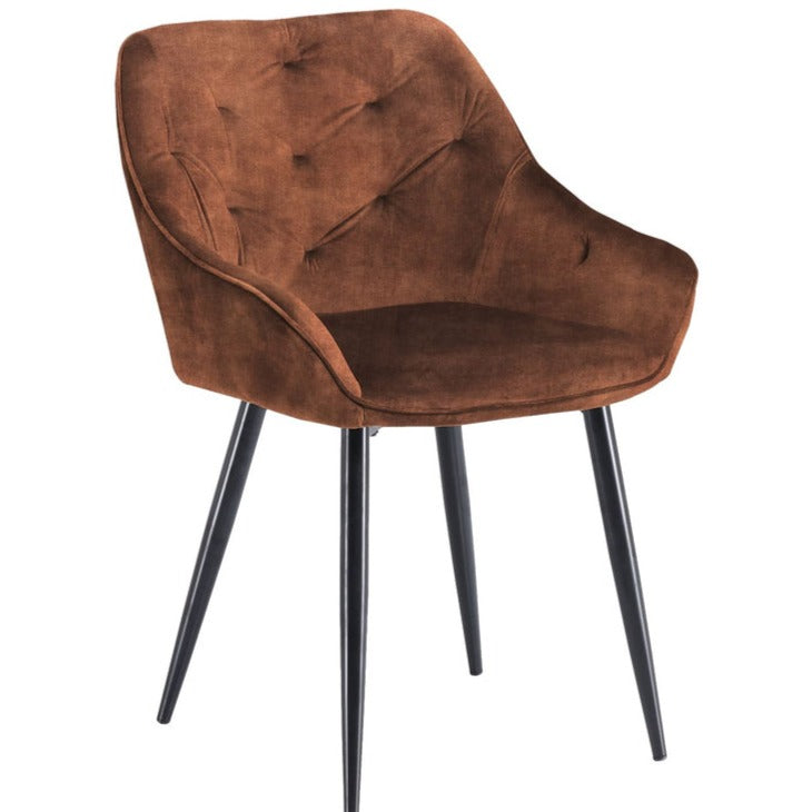 Voeg een vleugje elegantie toe aan je eetruimte met de Liverpool Eetkamerstoel - Set van 2. Zachte velours en een modern zwart metalen onderstel combineren stijlvol comfort.