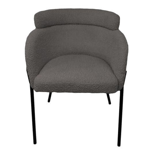Moderne eetkamerstoel met comfortabele zitting en stevig metalen onderstel.