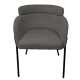 Moderne eetkamerstoel met comfortabele zitting en stevig metalen onderstel.